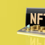 Coins on laptop keyboard with 'NFT' displayed on the screen